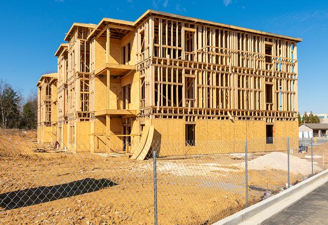 a snapshot of temporary chain link fences protecting a large construction project from unauthorized access in Orangeburg, NY